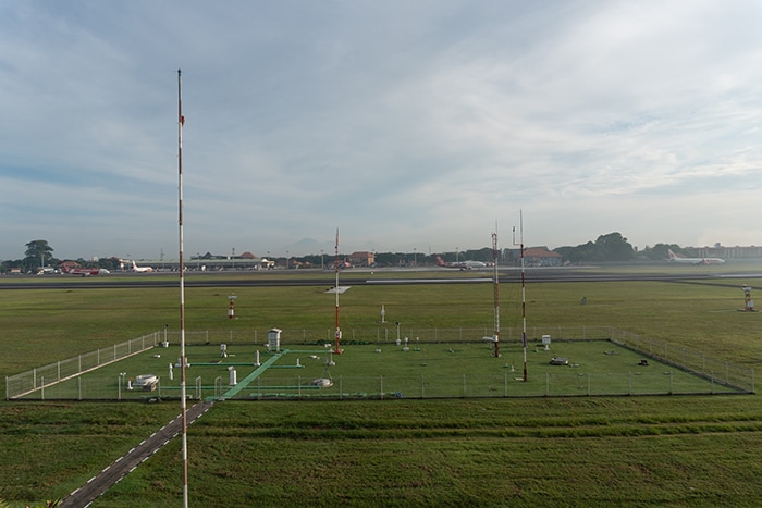 BADUNG/BALI-DECEMBER 07 2017: A landscape of Meteorological garden at Ngurah Rai Airport Bali in the morning when the sky full grey cirrus clouds